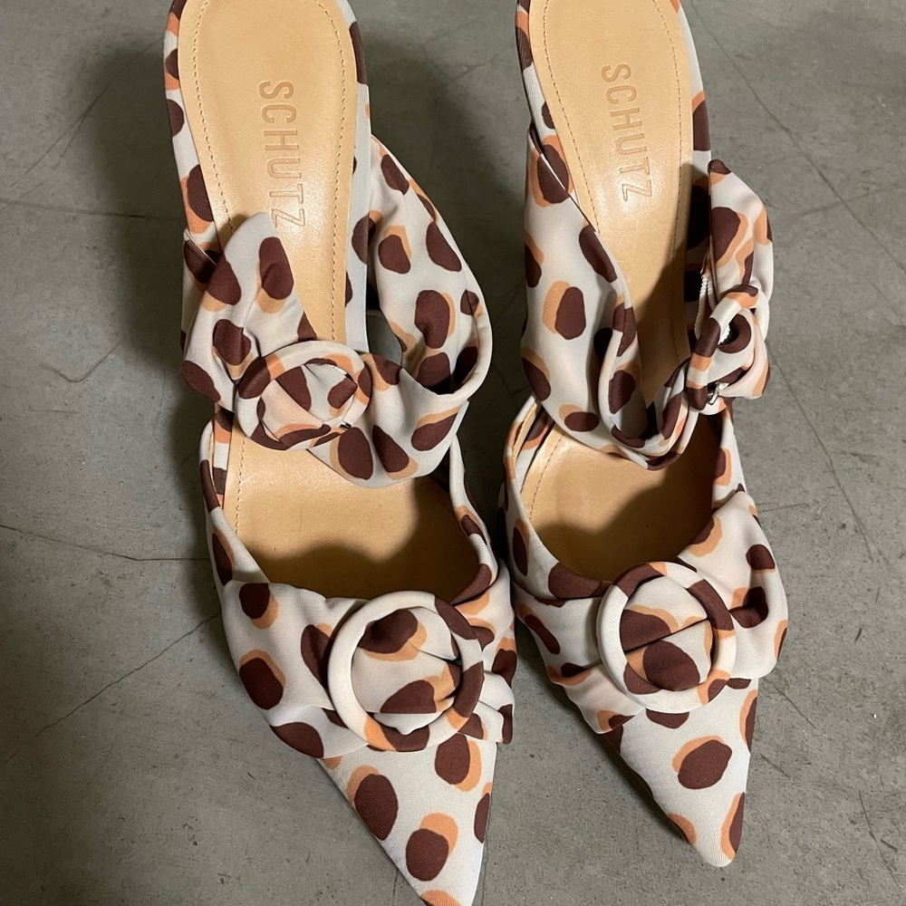 SCHUTZ polka dot pointed mules with buckle detail